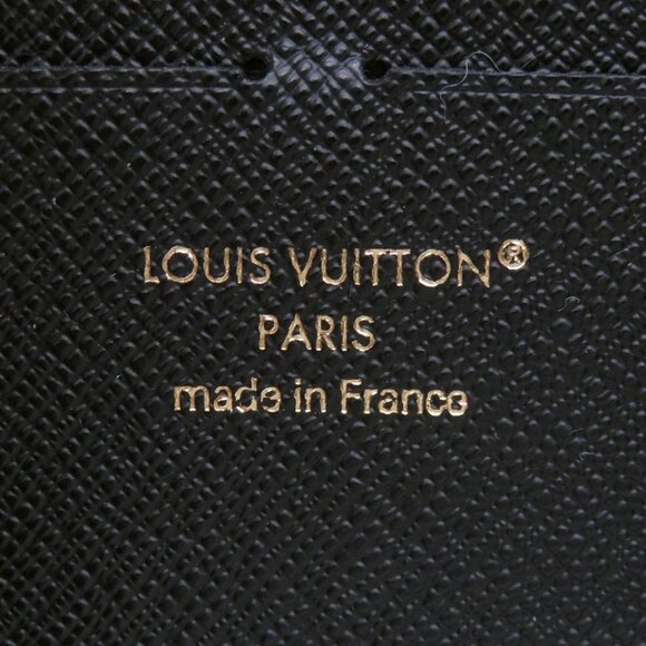 LOUIS VUITTON Portefeuille Clemence Monogram Reverse Canvas Noir - Picture 10 of 13